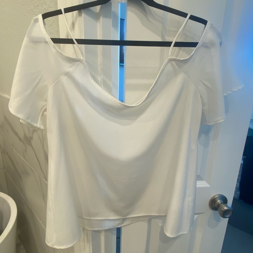 White off the shoulder sleeved top. Medium.